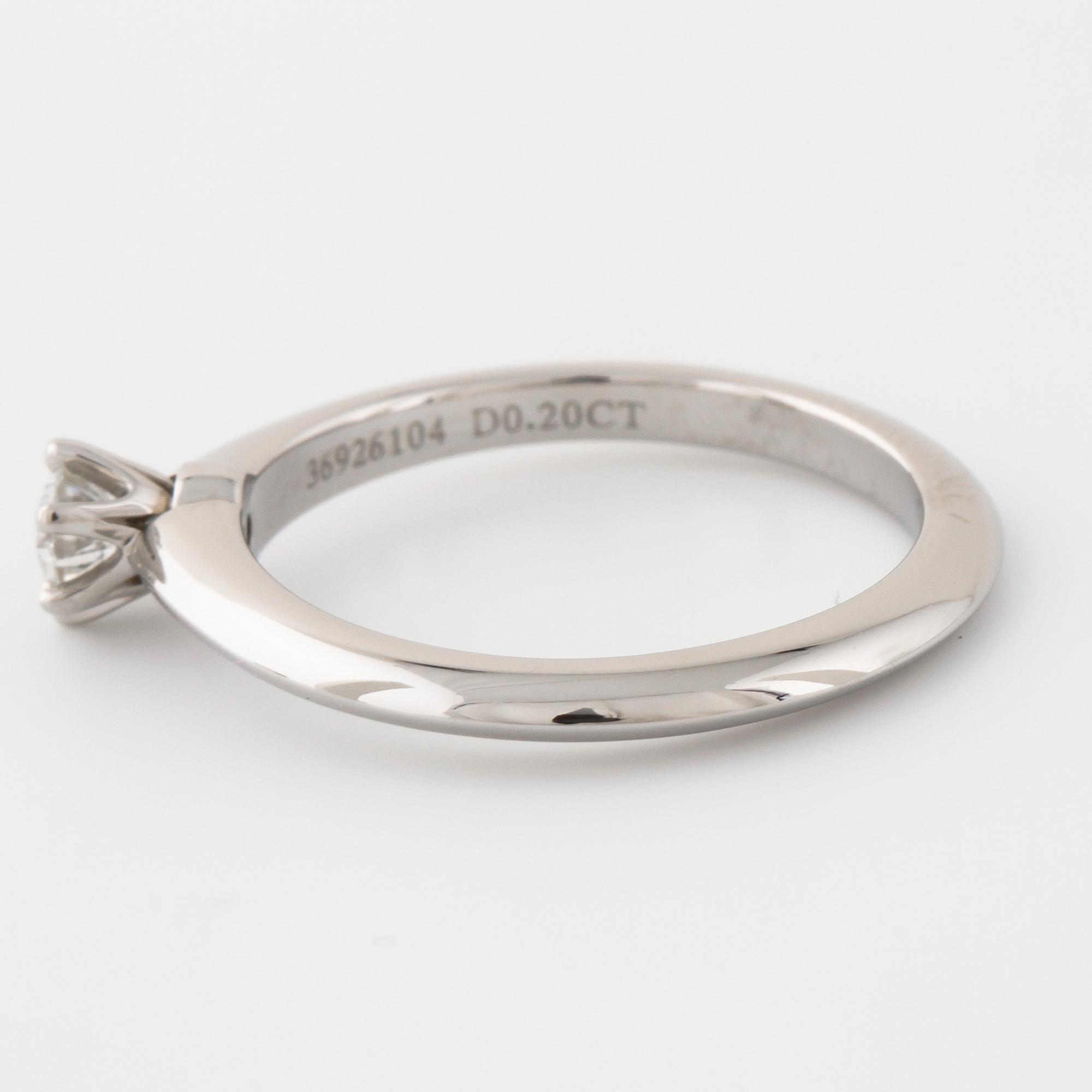 TIFFANY & CO, a brilliant cut diamond ring.