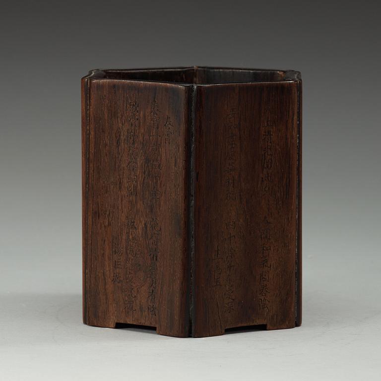 A Chinese wooden brush pot with inscriptions, 20th Century.