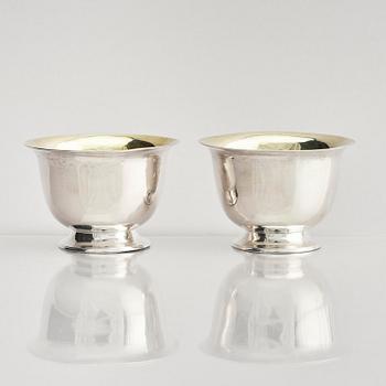 A pair of Swedish parcel-gilt silver dessert bowls with stand, mark of Gustaf Möllenborg, Stockholm 1830.