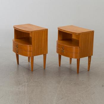 A pair of bedside tables from the mid 20th century.