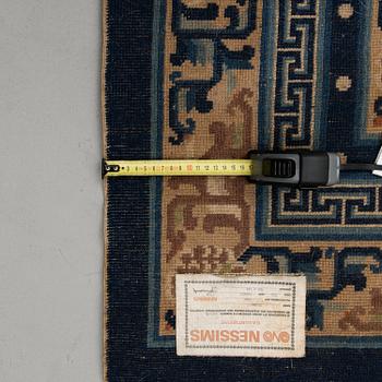 A Chinese carpet, ca 244 x 168 cm.