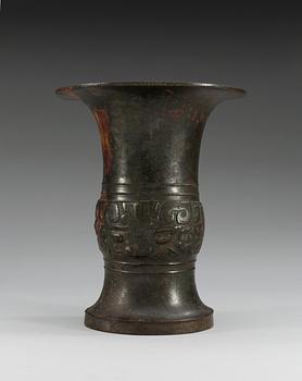 An archaic shaped bronze wine vessel, Tsun, in the style of Shang/early western Zhou style, presumably 17/18th Century.