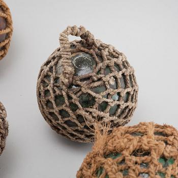 Ten 20th century glass floats.