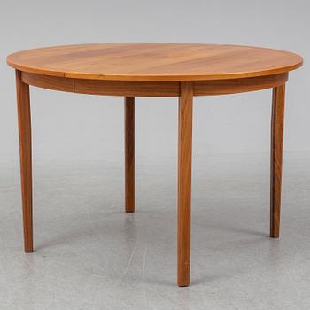 A 1950/60s teak and valnut table and four chairs.