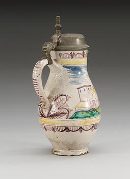 A German pewter mounted faience tankard, 18th Century.