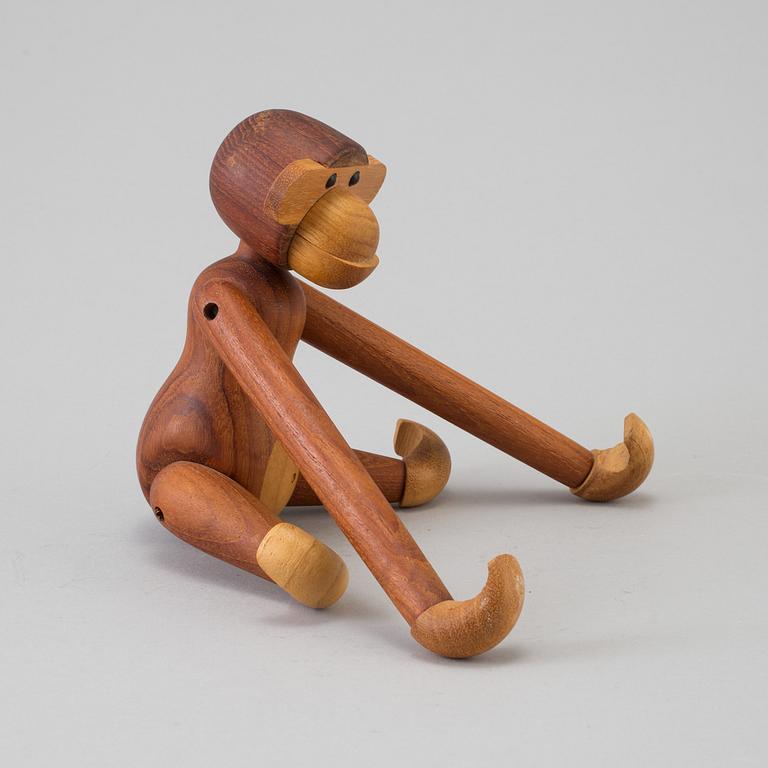 A Kay Bojesen wood figurine in the shape of a monkey.