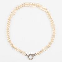 Pearl necklace, double-stranded, cultured pearls, clasp in white gold set with rose-cut diamonds.