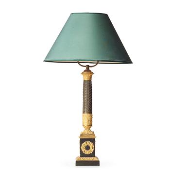 79. A French late Empire 19th century table lamp.