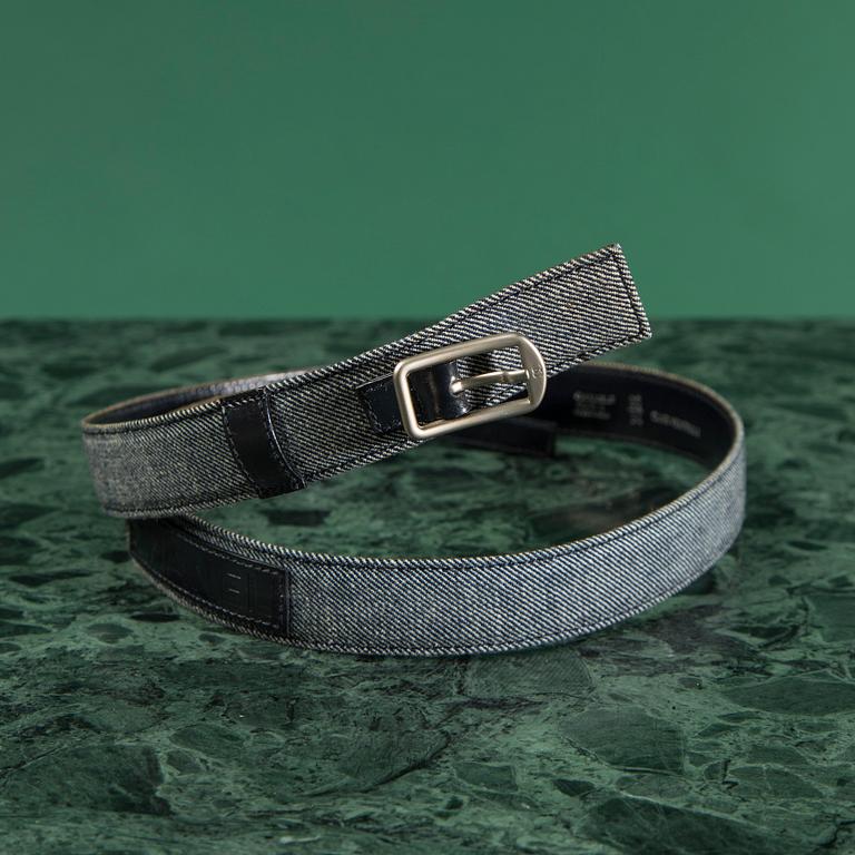 A belt and three bows, by CHANEL.