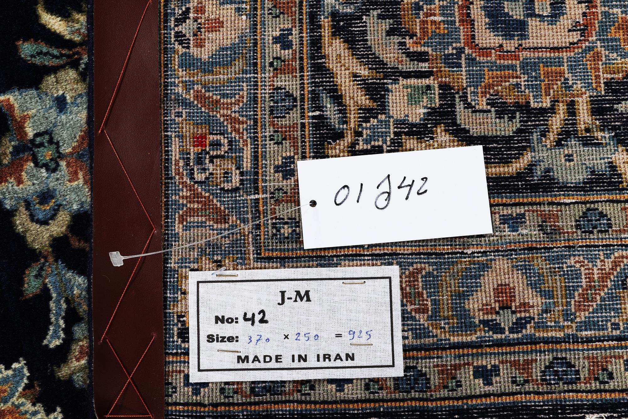 A carpat, Kashan signed Reza Torshi, ca 370 x 250 cm.
