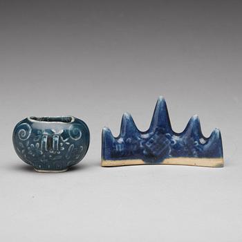 A blue glazed brush rest and a brush washer/birdcup, Qing dynasty (1644-1912).