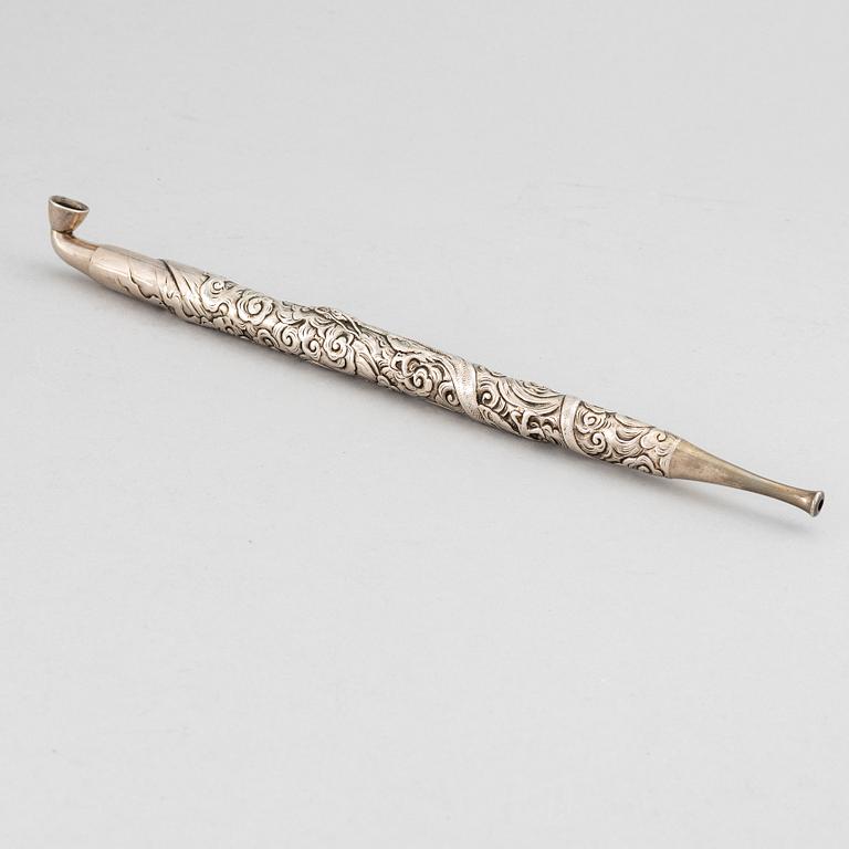 A Japanese silver opium pipe, Meiji period (1868-1912).