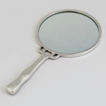 A Svenskt Tenn pewter mirror.