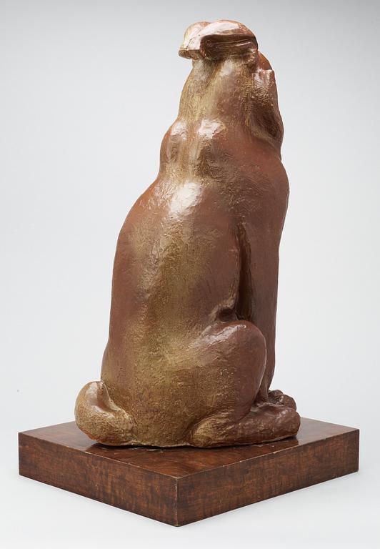 A Michael Schilkin stoneware sculpture of a seated lynx, Arabia.