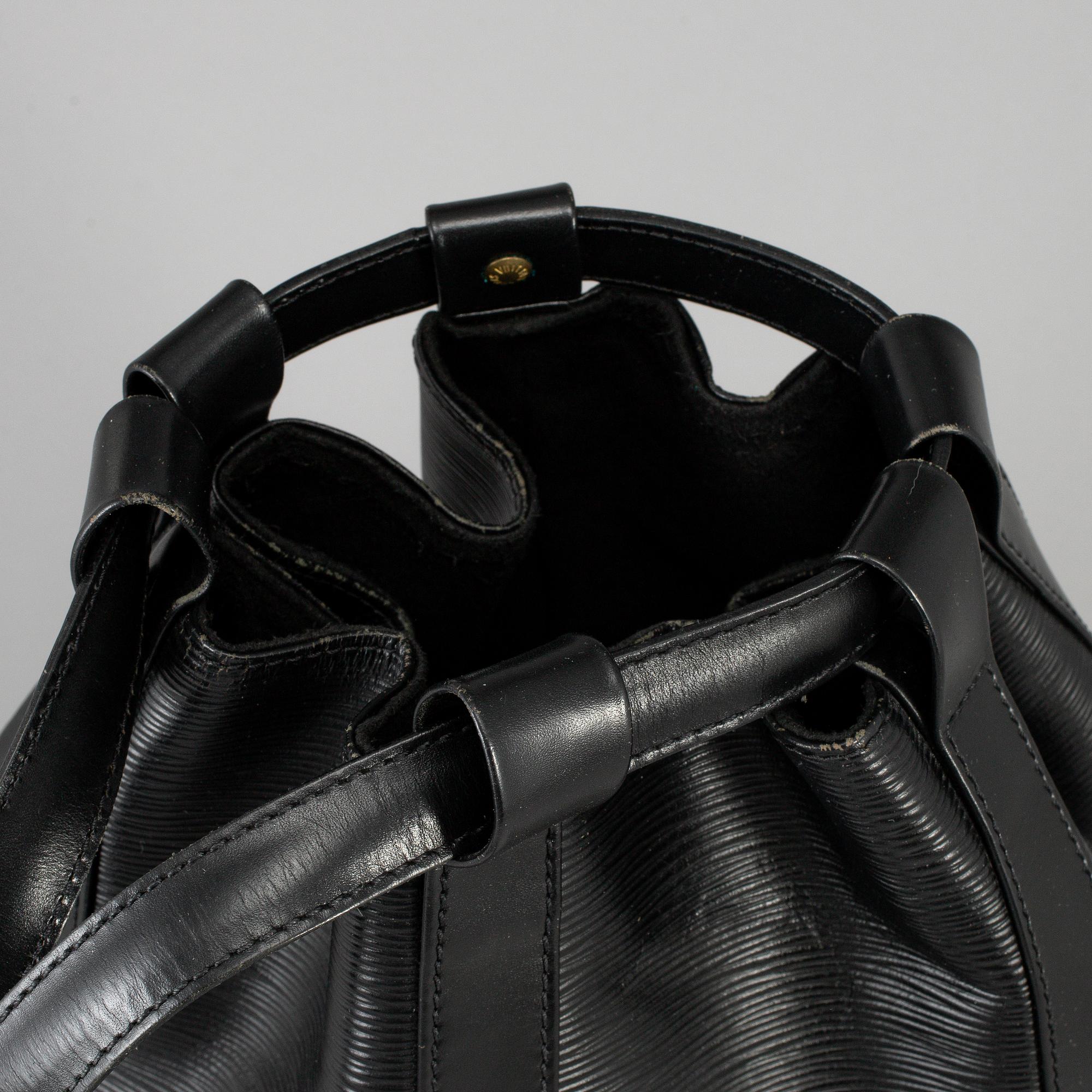 LOUIS VUITTON, a 'Randonne' black Epi bag.