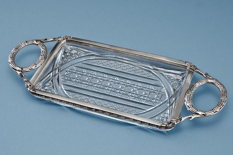 A CRYSTAL AND SILVER TRAY.