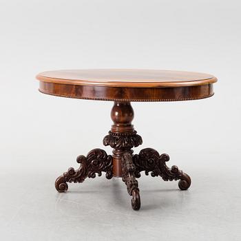 A mid 19th century mahogny table.