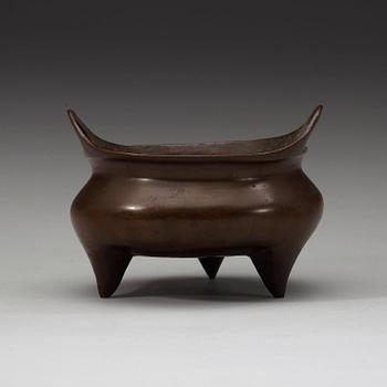 A bronze tripod cencer, Ming dynasty.