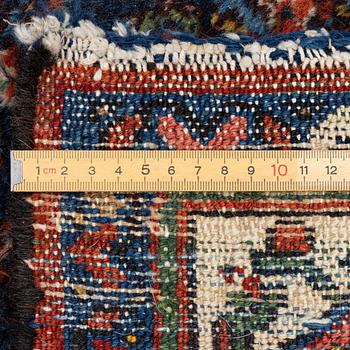 An oriental, semi-antique rug, c. 195 x 130 cm.