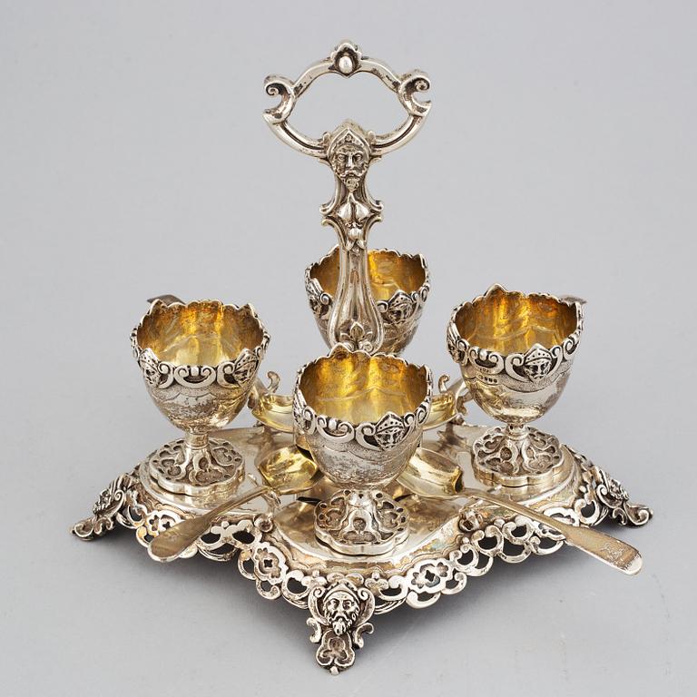 An English silver-gilt egg cruet set, mark of James Charles Edington, London 1857.