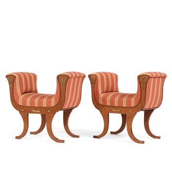 84. A pair of Swedish Royal Empire stools.