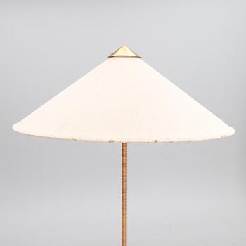 A mid-20th century floor lamp for Idman.