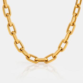 1032. A Cartier necklace in 18K gold.