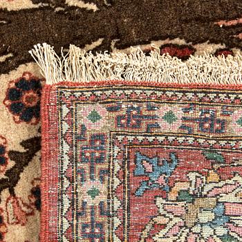 A semiantique Ghom carpet ca 210 x 143 cm.