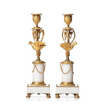 116. A pair of Louis XVI late 18th century candlesticks.