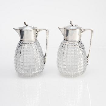 A pair of parcel-gilt silver and "hobnail" crystal decanters, W.A. Bolin, Stockholm 1920.