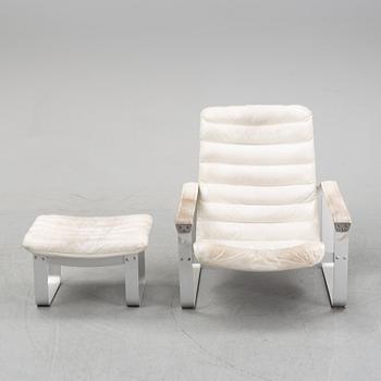 Ilmari Lappalainen, a lounge chair with ottoman, model "Pulkka" for Asko, Finland. Designed in 1968.