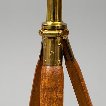 A brass telescope, circa 1900.