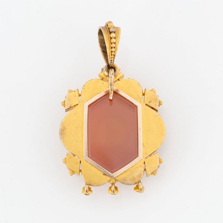 A 19th century 14K gold pendant with a hardstone cameo.