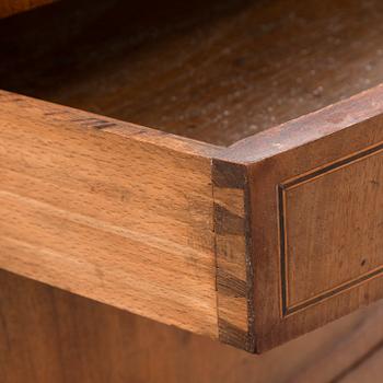 An empire style chest of drawers, 19th Century.