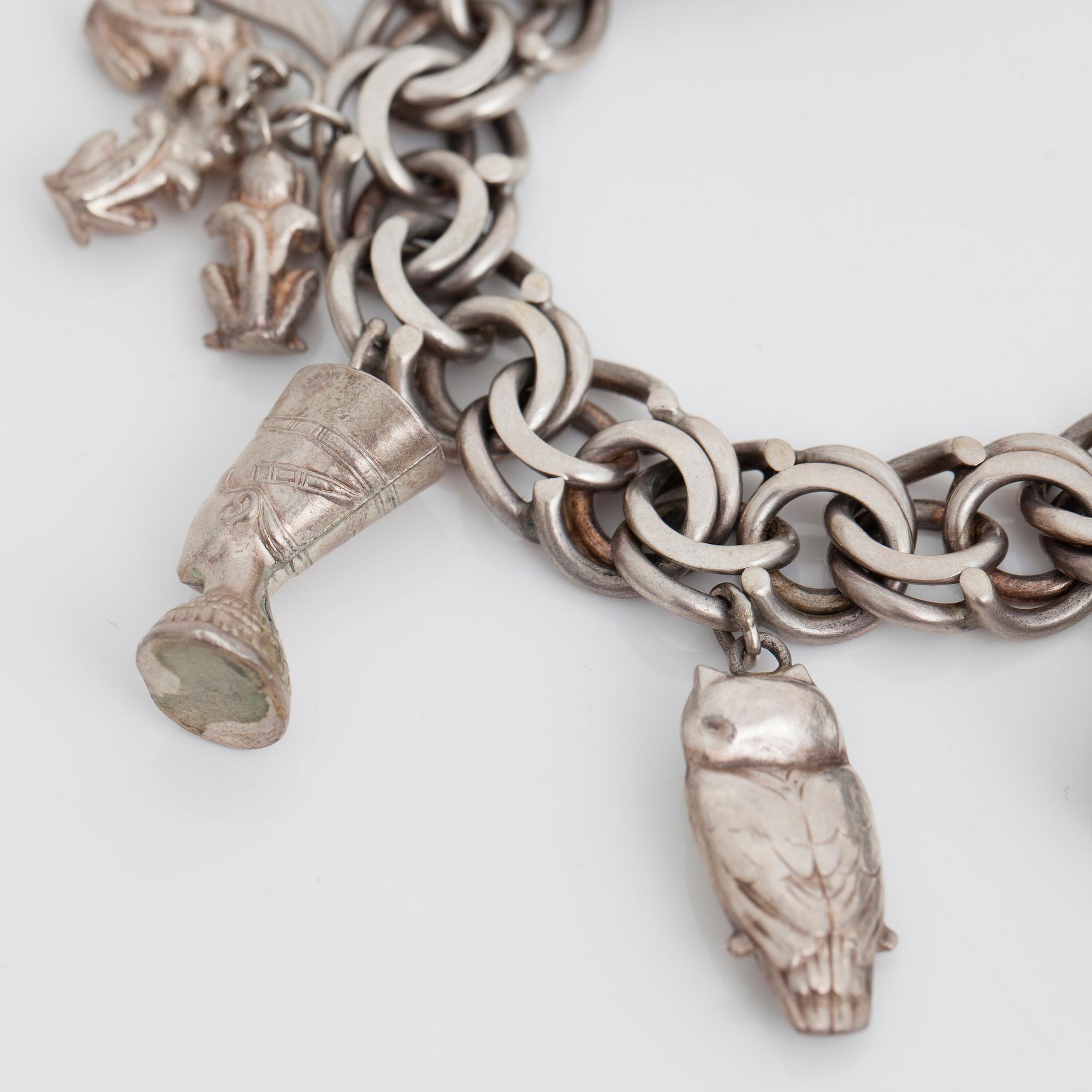 BERLOCKARMBAND, silver, 1900-talets andra hälft.