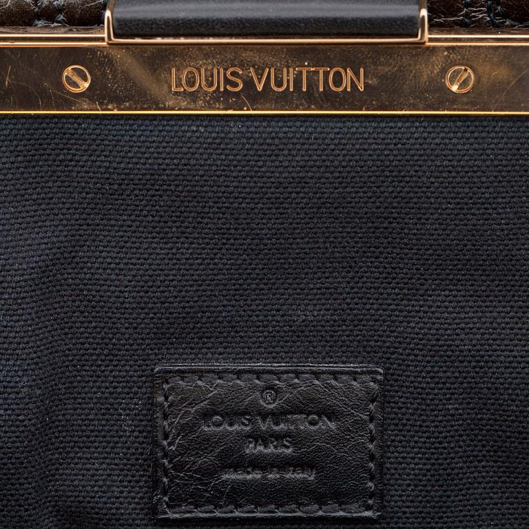 LOUIS VUITTON, a maroon "Monogram Motard Biker" shoulder bag.