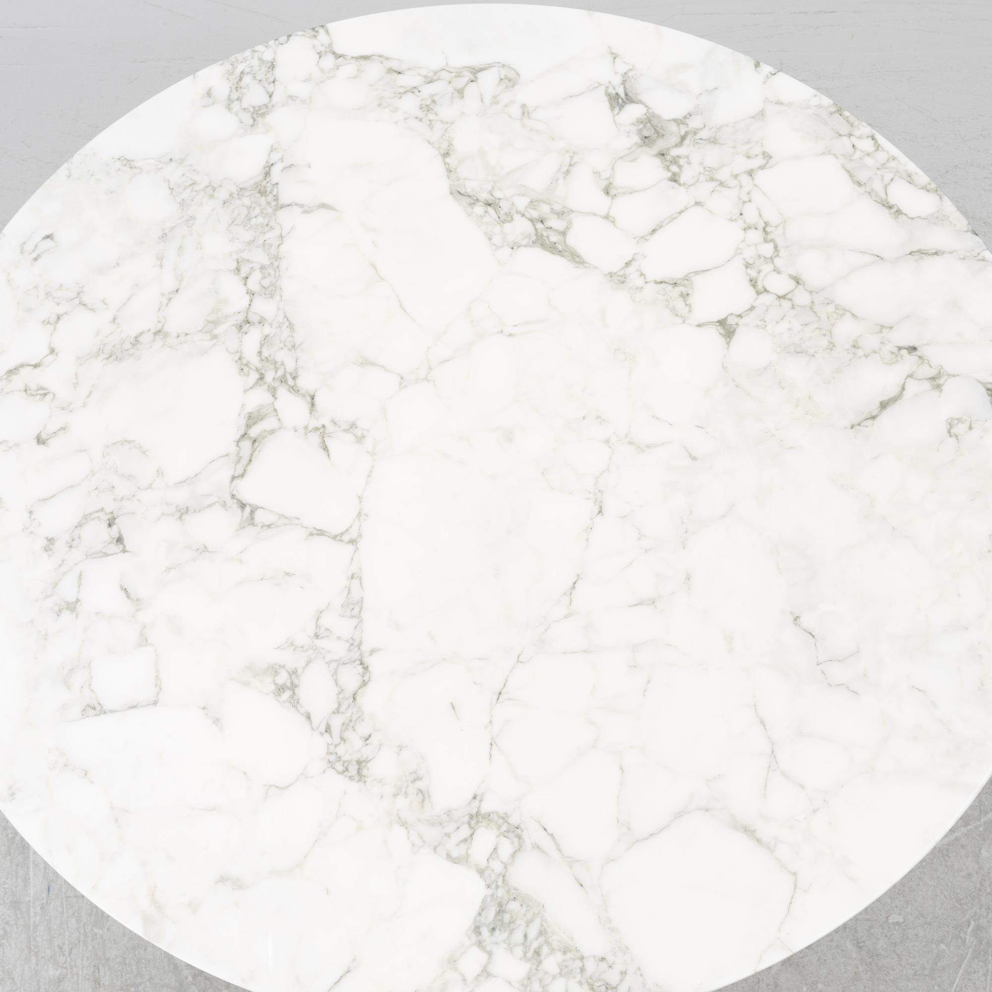 Eero Saarinen, a "Tulip" Arabesco marble top dining table, Knoll.