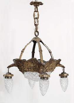 An Art Nouveau patinated brass ceiling lamp, attributed to Alice Nordin, by Böhlmarks, Stockholm 1910's-20's.