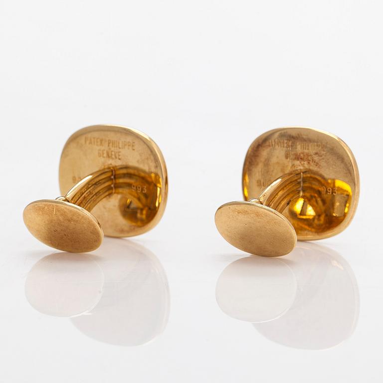 Patek Philippe, a pair of 18K gold 'Ellipse' cufflinks.