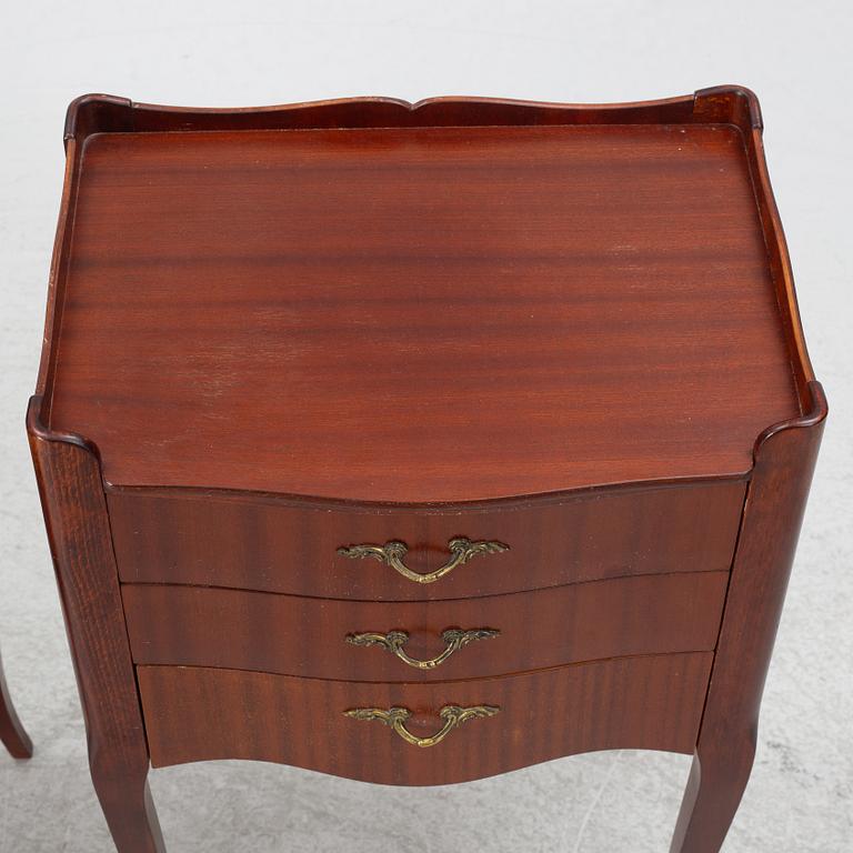 A pair of Rococo style bedside tables, second half of the 20th Century.