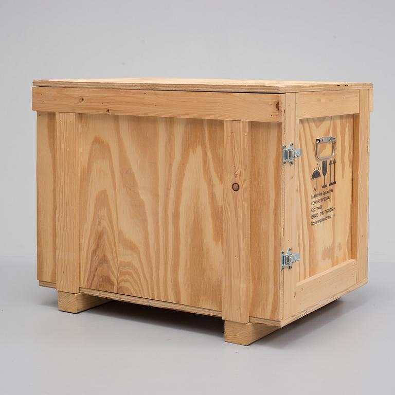 "YVES SAINT LAURENT. Haute Couture. L'OEUVRE INTÉGRAL 1962-2002". Ltd edition in a specially made custom wooden cabinet.