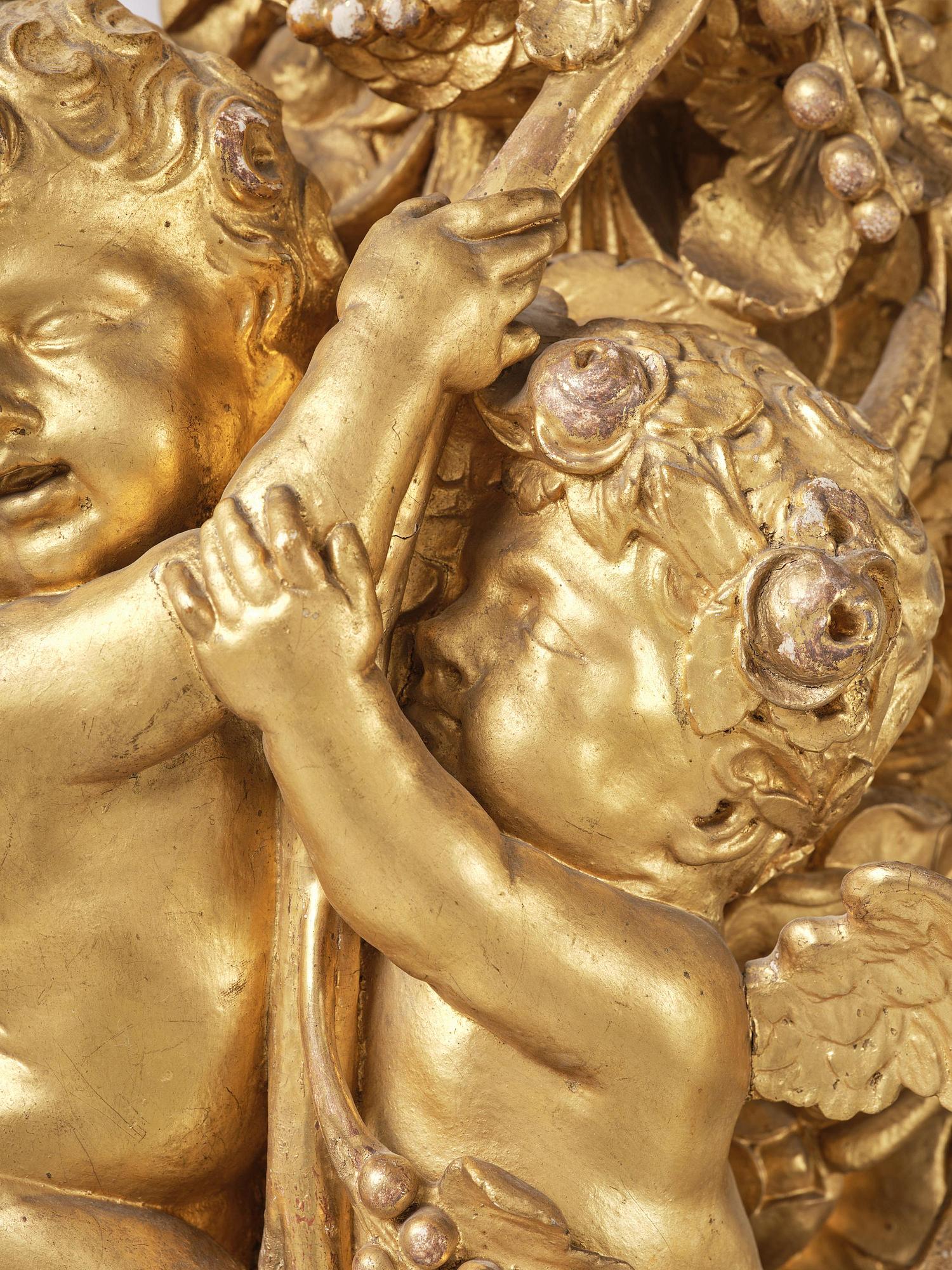 A presumably Dutch Louis XIV carved giltwood frame with mirror glass, in the style of Jean Le Pautre, late 17th century.