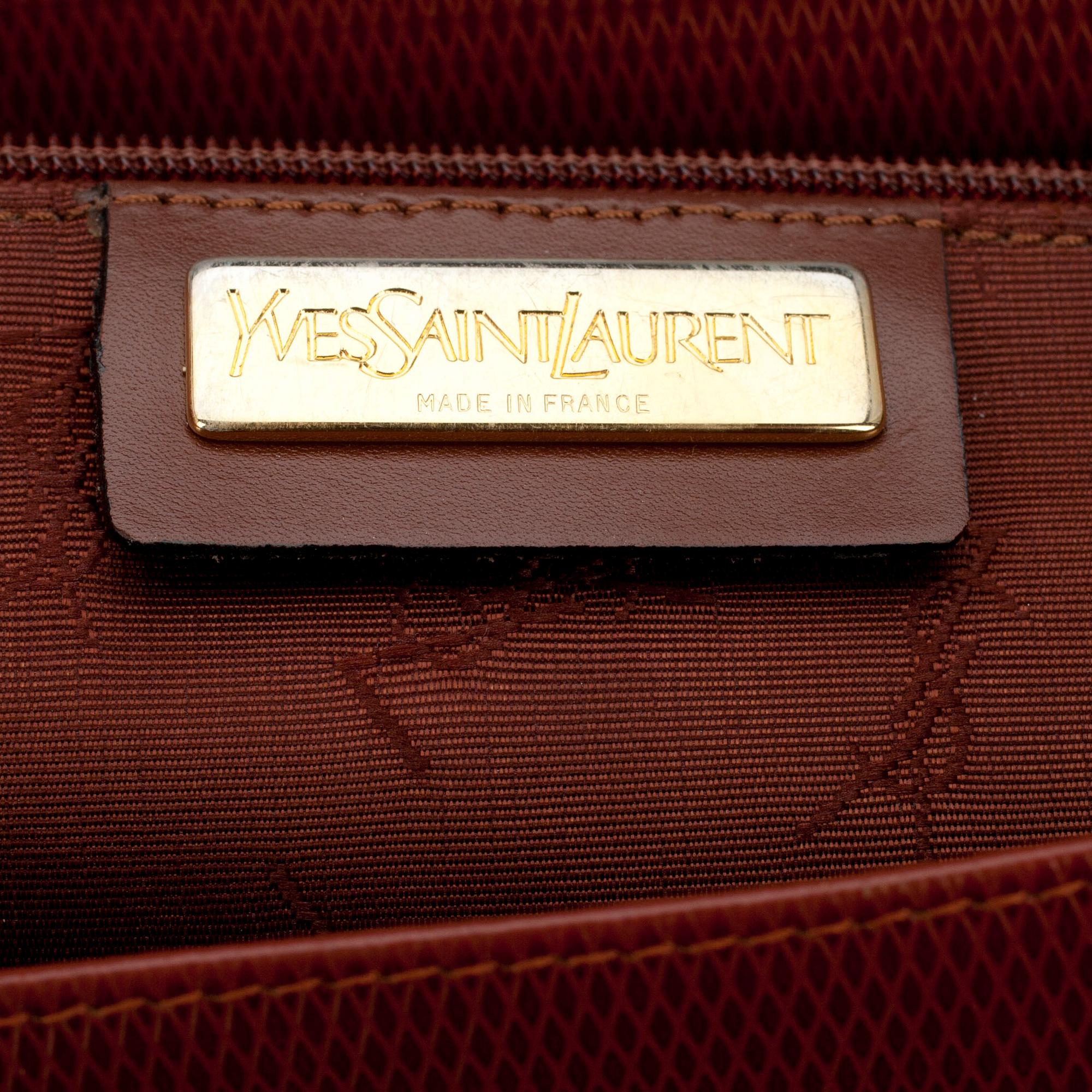 PORTFÖLJ, Yves Saint Laurent.