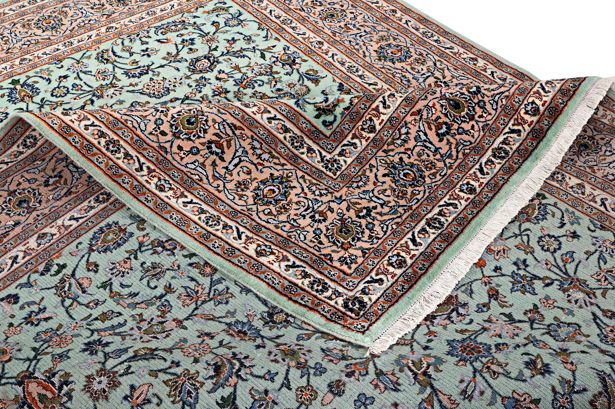 A Kashan carpet, c. 394 x 284 cm.