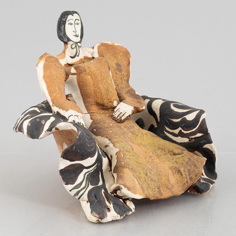 Ulrica Hydman-Vallien, a stoneware sculpture of a seated woman, executed in her own workshop, Sweden.