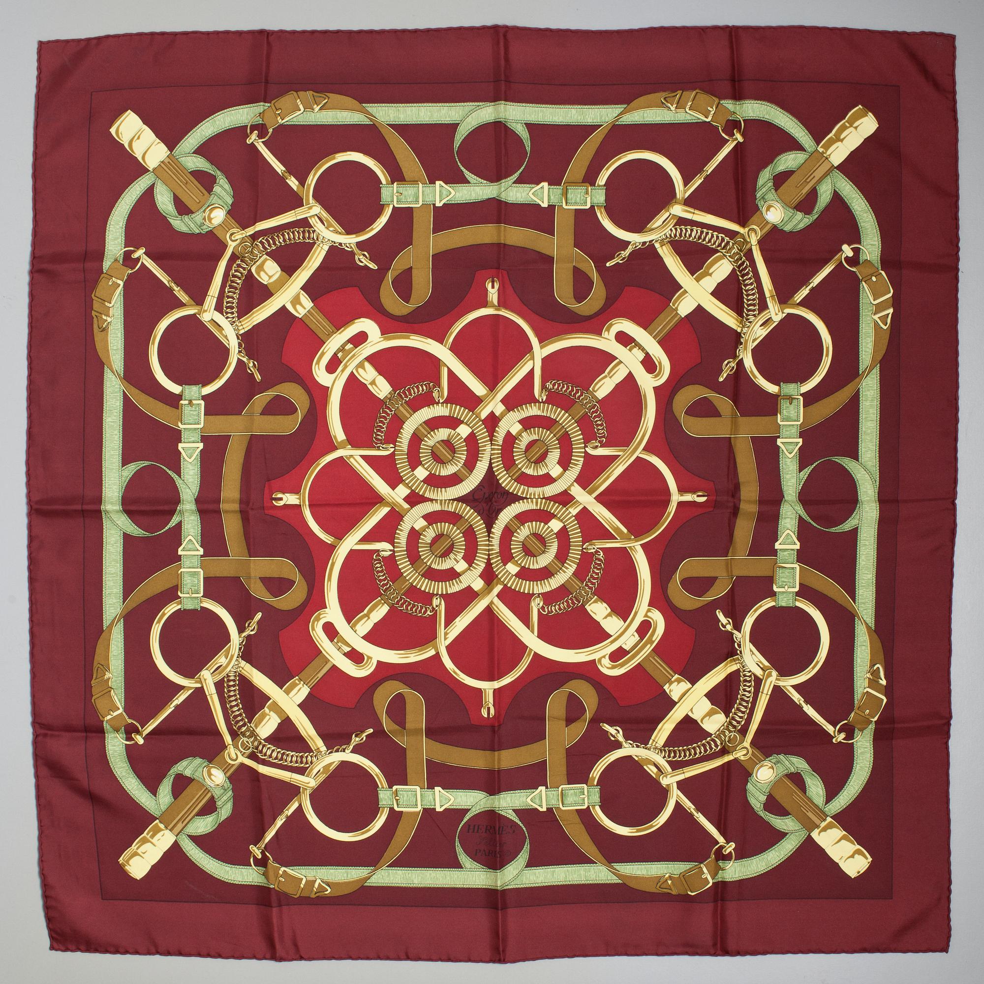 A Hermès silk scarf "Eperon d'Or".