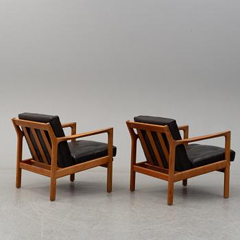 KARL ERIK EKSELIUS, a pair of 1960's teak armchairs.