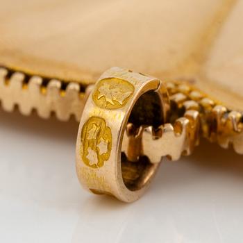 Heart locket, 18K gold with glass.