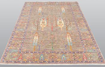 A rug, Ziegler design figural, ca 241 x 169 cm.