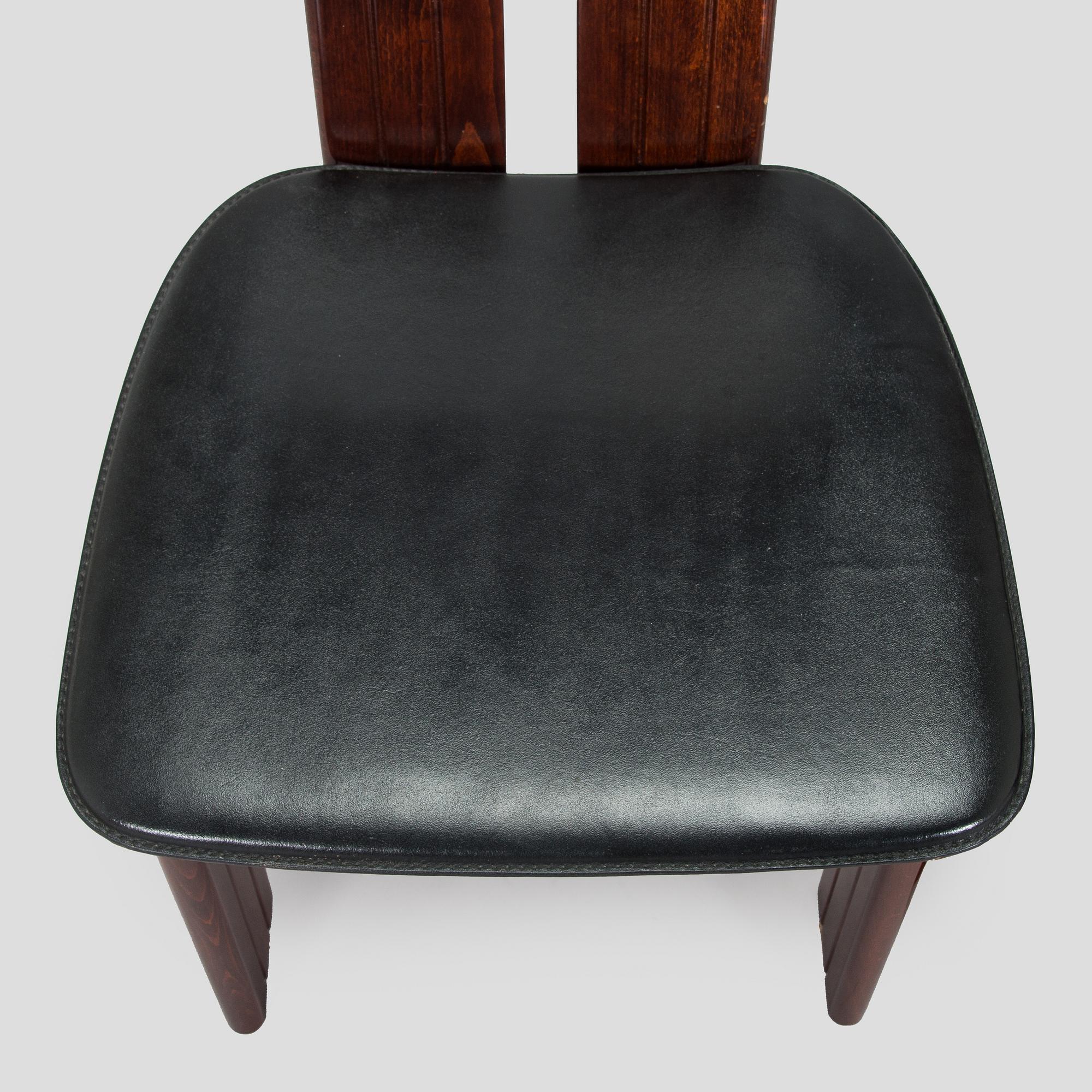 A set of eight dining chairs, Italy.